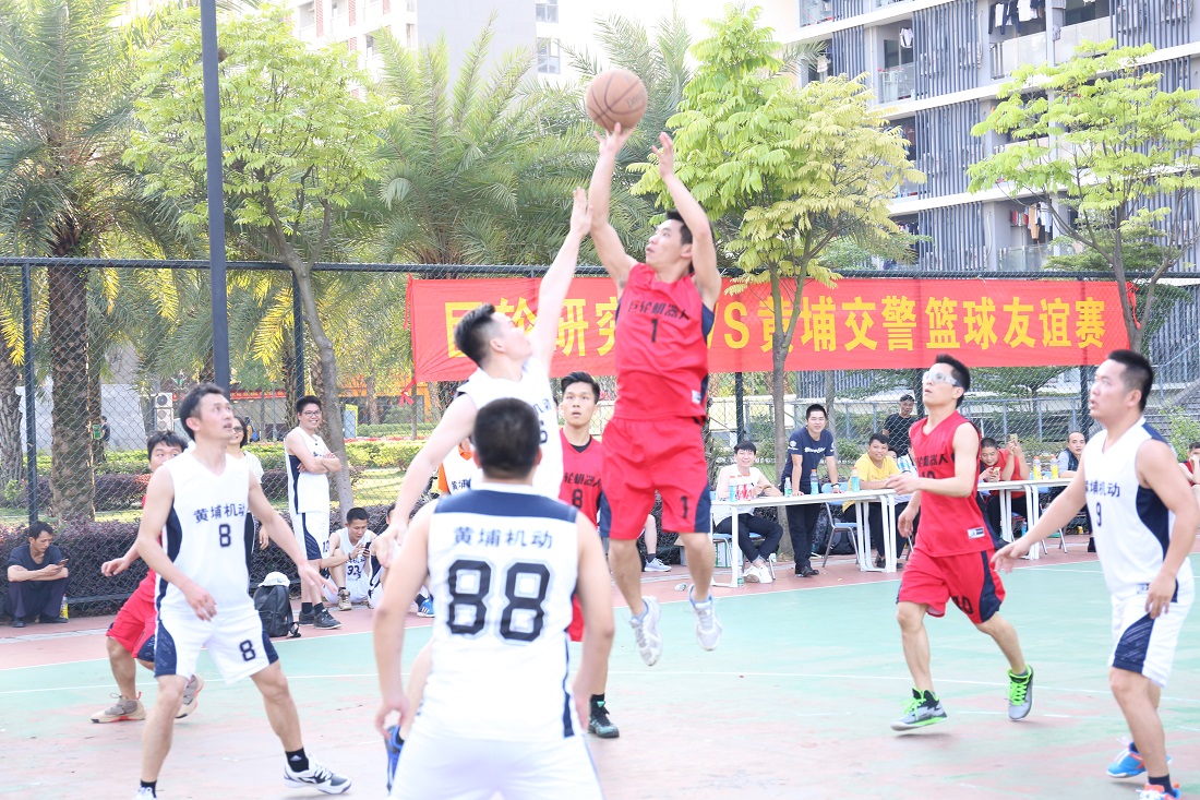 Police and corporate staff launched a basketball friendly match